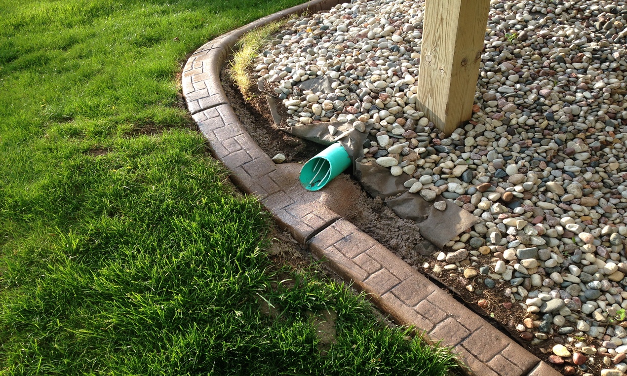 Blending in drainage tile to landscape